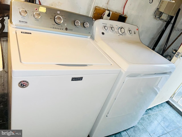 laundry area with washer and dryer and laundry area
