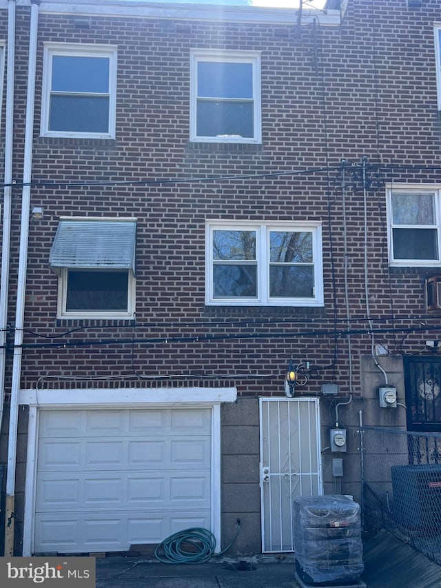 view of home's exterior featuring brick siding