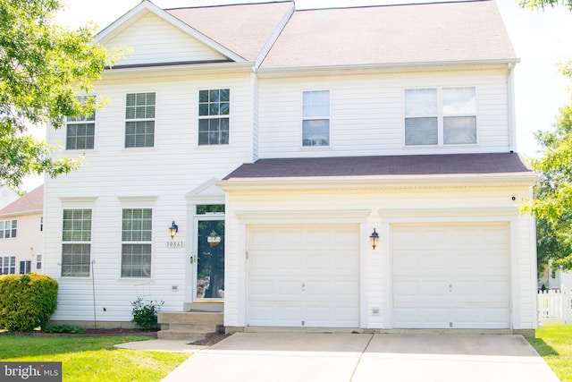 10861 Smugglers Notch Ct, White Plains, MD 20695 - view of front facade featuring an attached garage and driveway