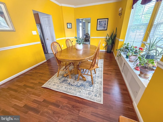 10861 Smugglers Notch Ct, White Plains, MD 20695 - dining room with crown molding, wood finished floors, and baseboards