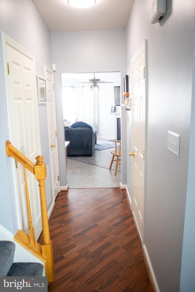 10861 Smugglers Notch Ct, White Plains, MD 20695 - hall featuring wood finished floors, baseboards, and stairway