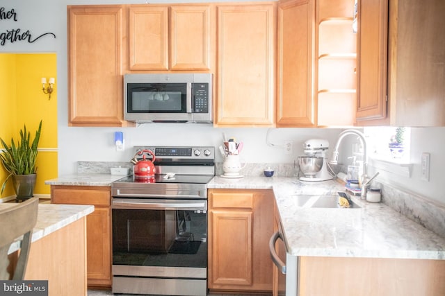 10861 Smugglers Notch Ct, White Plains, MD 20695 - kitchen with appliances with stainless steel finishes, a sink, and light countertops