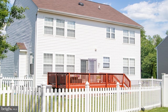 10861 Smugglers Notch Ct, White Plains, MD 20695 - rear view of property featuring a wooden deck
