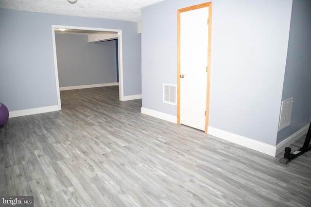 10861 Smugglers Notch Ct, White Plains, MD 20695 - empty room featuring wood finished floors and baseboards