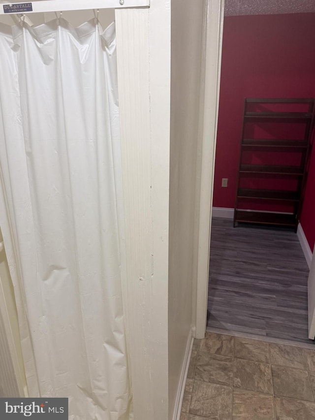 10861 Smugglers Notch Ct, White Plains, MD 20695 - bathroom with baseboards