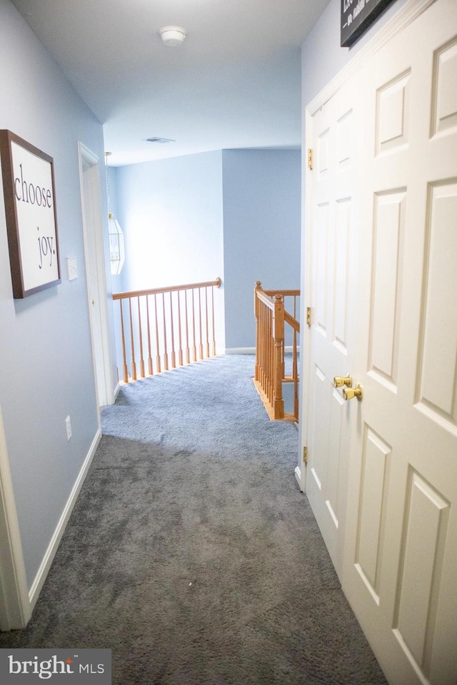 10861 Smugglers Notch Ct, White Plains, MD 20695 - hallway with carpet, an upstairs landing, and baseboards