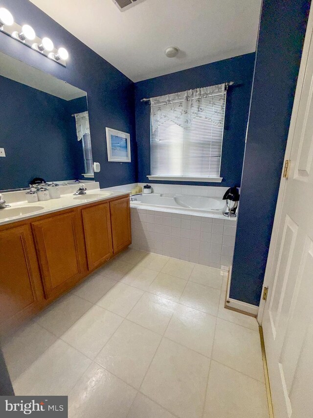 10861 Smugglers Notch Ct, White Plains, MD 20695 - bathroom with tile patterned flooring, a garden tub, and double vanity