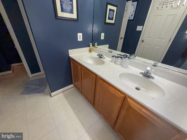 10861 Smugglers Notch Ct, White Plains, MD 20695 - bathroom with baseboards, double vanity, and tile patterned flooring