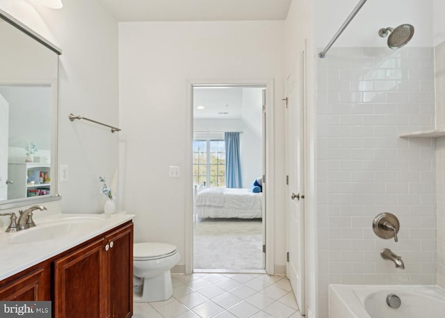 full bath with tile patterned floors, connected bathroom, vanity, shower / tub combination, and toilet