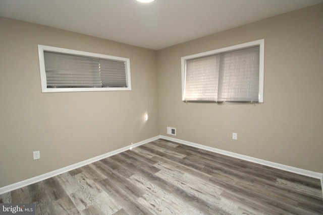2214 Wintergreen Ave, District Heights, MD 20747 - unfurnished room featuring visible vents, baseboards, and wood finished floors