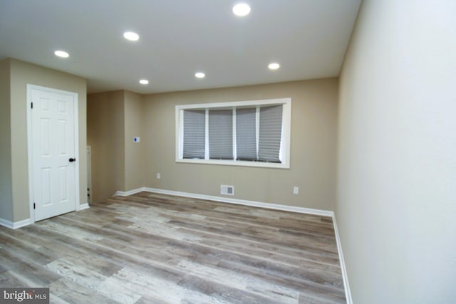 2214 Wintergreen Ave, District Heights, MD 20747 - spare room with wood finished floors, baseboards, visible vents, and recessed lighting
