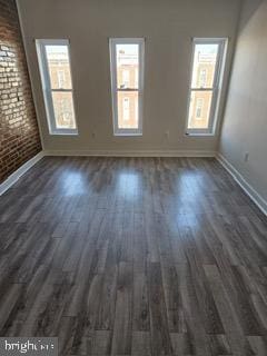 1125 Nanticoke St, Baltimore, MD 21230 - interior space featuring baseboards and wood finished floors