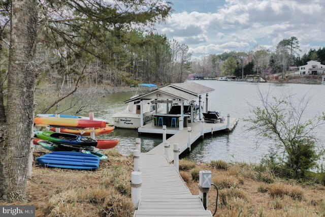dock area featuring a water view and boat lift