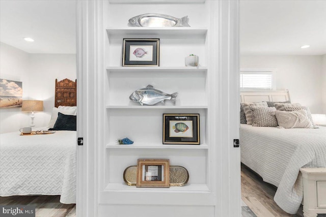 bedroom featuring wood finished floors