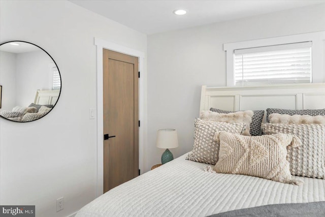 bedroom featuring recessed lighting