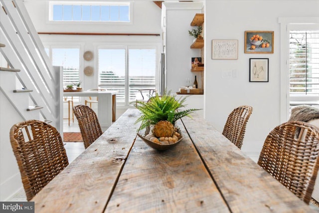 dining room with stairs