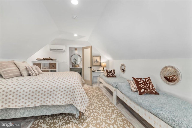 bedroom with recessed lighting, vaulted ceiling, and a wall unit AC