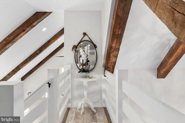 room details with recessed lighting, beamed ceiling, and wood finished floors