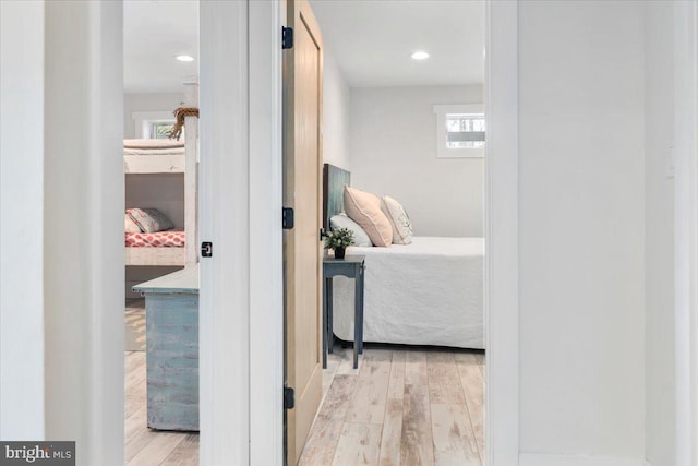 corridor with recessed lighting and light wood-style floors