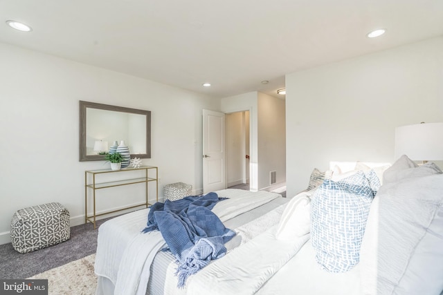 bedroom featuring visible vents, baseboards, carpet flooring, and recessed lighting