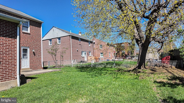 view of yard with a fenced backyard