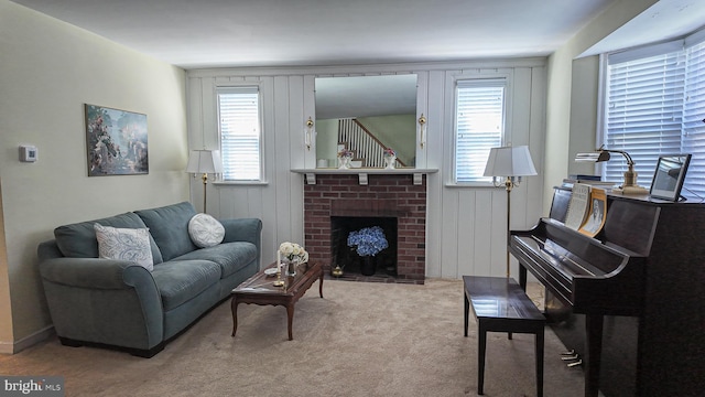 carpeted living room with a brick fireplace