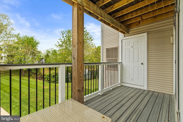 20605 Cornstalk Ter Unit 201, Ashburn, VA 20147 - wooden deck with a yard