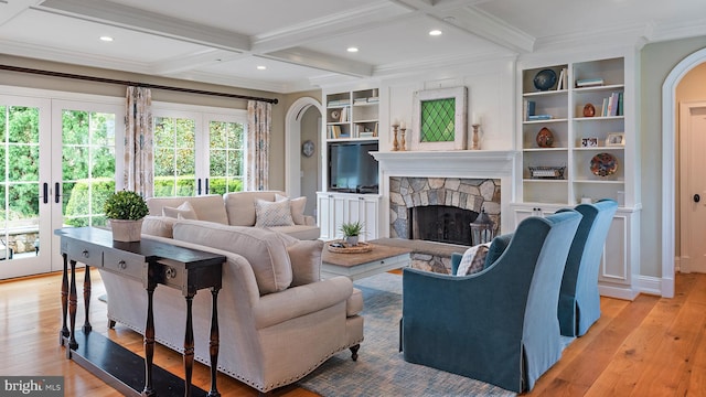 208 Wardour Dr, Annapolis, MD 21401 - living room featuring a fireplace, light wood-type flooring, and ornamental molding