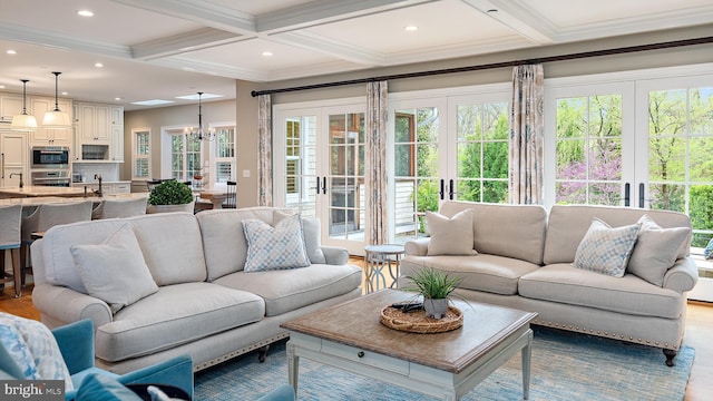 208 Wardour Dr, Annapolis, MD 21401 - sunroom featuring a chandelier, plenty of natural light, beam ceiling, and french doors