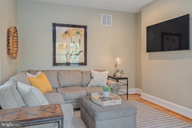 208 Wardour Dr, Annapolis, MD 21401 - living room with baseboards, light wood-style flooring, and visible vents