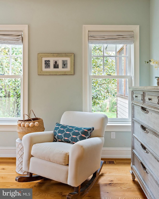 208 Wardour Dr, Annapolis, MD 21401 - sitting room featuring wood finished floors, a healthy amount of sunlight, and baseboards