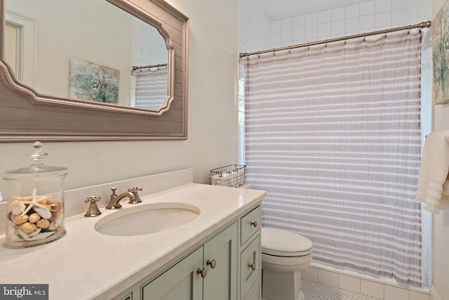 208 Wardour Dr, Annapolis, MD 21401 - bathroom with a shower with shower curtain, tile patterned flooring, vanity, and toilet