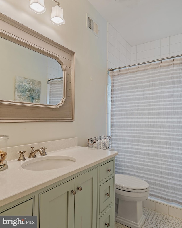 208 Wardour Dr, Annapolis, MD 21401 - bathroom featuring toilet, visible vents, tile patterned flooring, a shower with shower curtain, and vanity