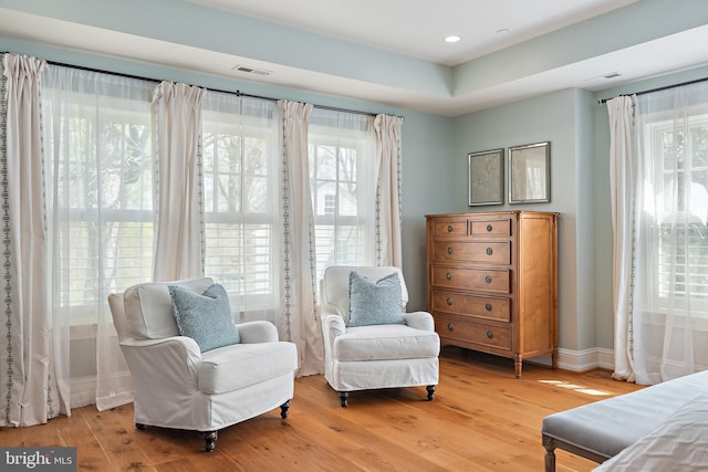 208 Wardour Dr, Annapolis, MD 21401 - living area with light wood-style flooring, visible vents, and baseboards