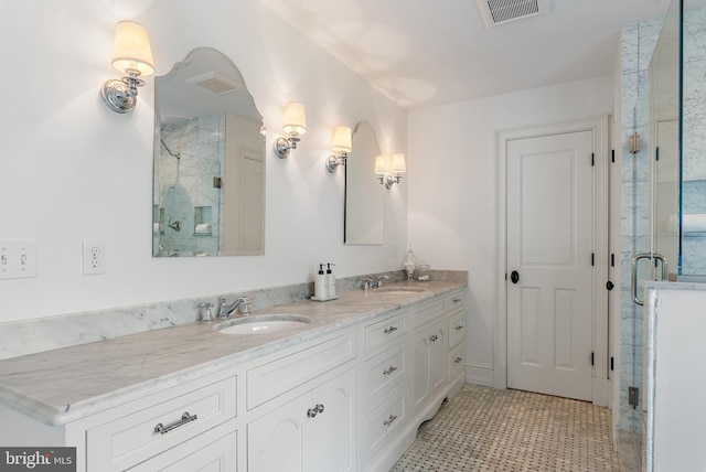 208 Wardour Dr, Annapolis, MD 21401 - full bath featuring tile patterned floors, double vanity, visible vents, a sink, and a stall shower
