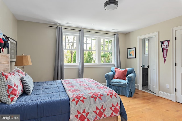 208 Wardour Dr, Annapolis, MD 21401 - bedroom featuring baseboards, light wood-style floors, and visible vents