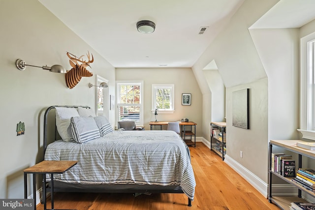 208 Wardour Dr, Annapolis, MD 21401 - bedroom with light wood-type flooring, baseboards, and visible vents
