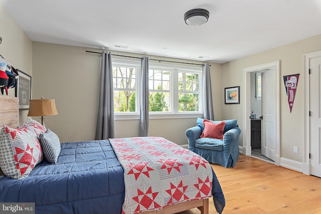 208 Wardour Dr, Annapolis, MD 21401 - bedroom featuring light wood-type flooring, visible vents, and baseboards