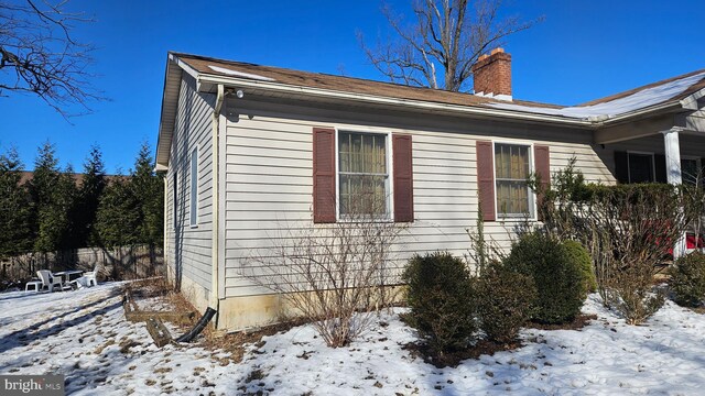 321 Central Ave, Malvern, PA 19355 - snow covered property featuring a chimney