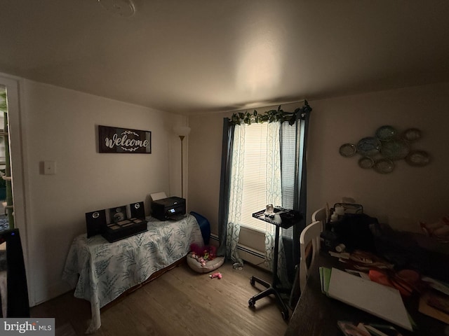 bedroom featuring wood finished floors