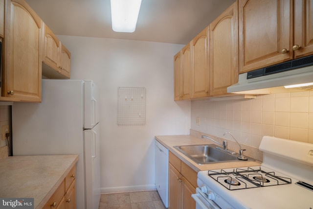 1931 N Cleveland St Unit 312, Arlington, VA 22201 - kitchen with light brown cabinets, a sink, decorative backsplash, white appliances, and under cabinet range hood