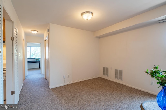 1931 N Cleveland St Unit 312, Arlington, VA 22201 - unfurnished room with carpet, visible vents, and baseboards