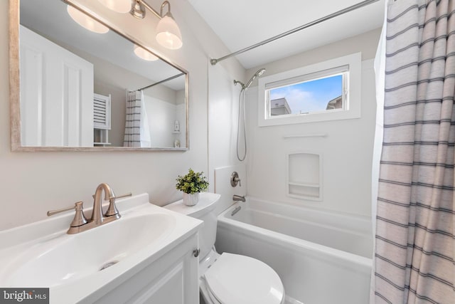 full bathroom with vanity, shower / bath combination with curtain, and toilet