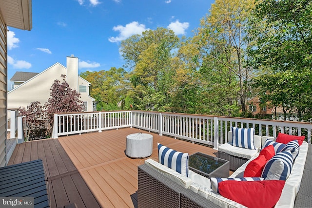 deck with an outdoor hangout area