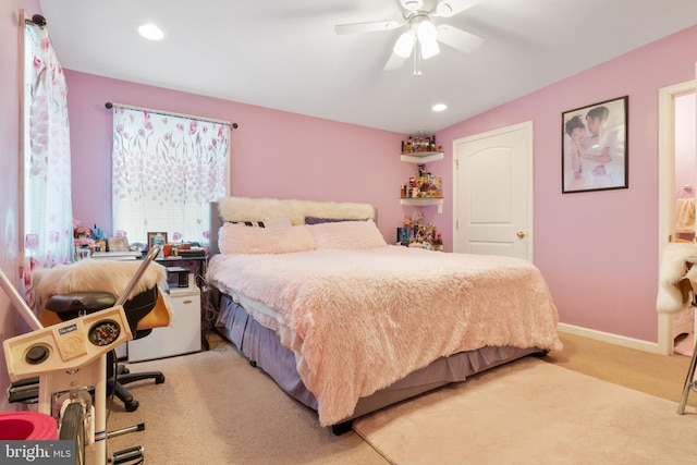bedroom featuring light carpet, recessed lighting, ceiling fan, and baseboards