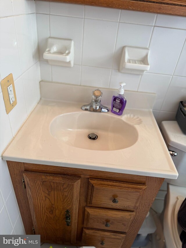 half bath with toilet and vanity