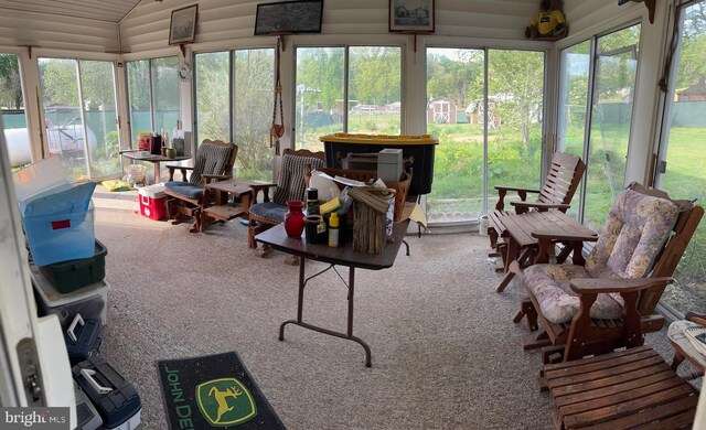 sunroom / solarium with a wealth of natural light