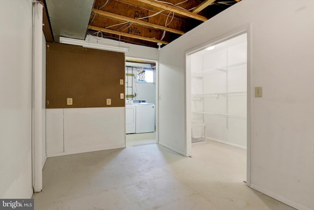 basement with washing machine and clothes dryer