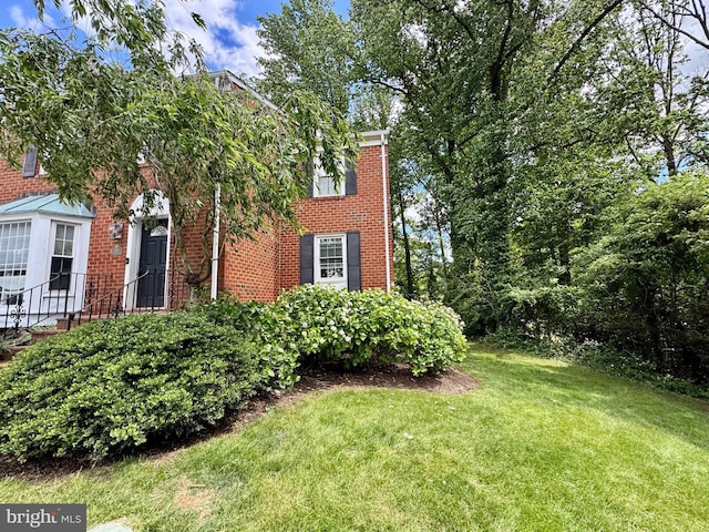 1282 Masters Dr Unit 190, Arnold, MD 21012 - view of property exterior with brick siding and a lawn