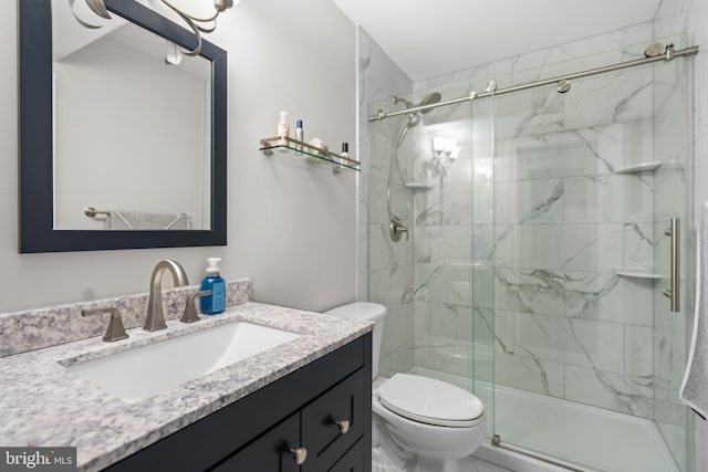 1 Pinkerton Ct, Stafford, VA 22554 - full bathroom featuring a marble finish shower, toilet, and vanity